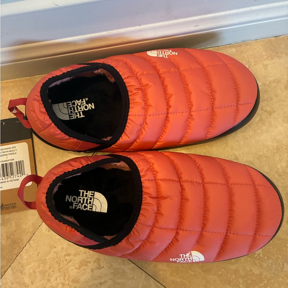 The North Face pink mules snow shoes